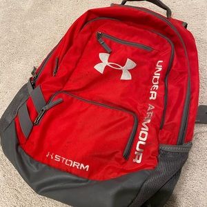 Under armor, red book bag